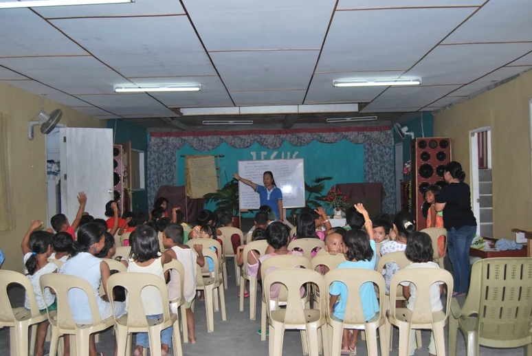 A children’s activity at Gusa Simbahan